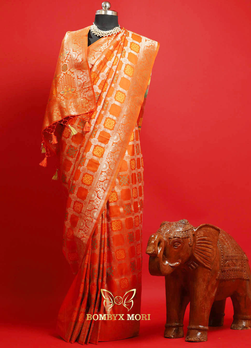 Glowing Orange Gharchola Silk Saree