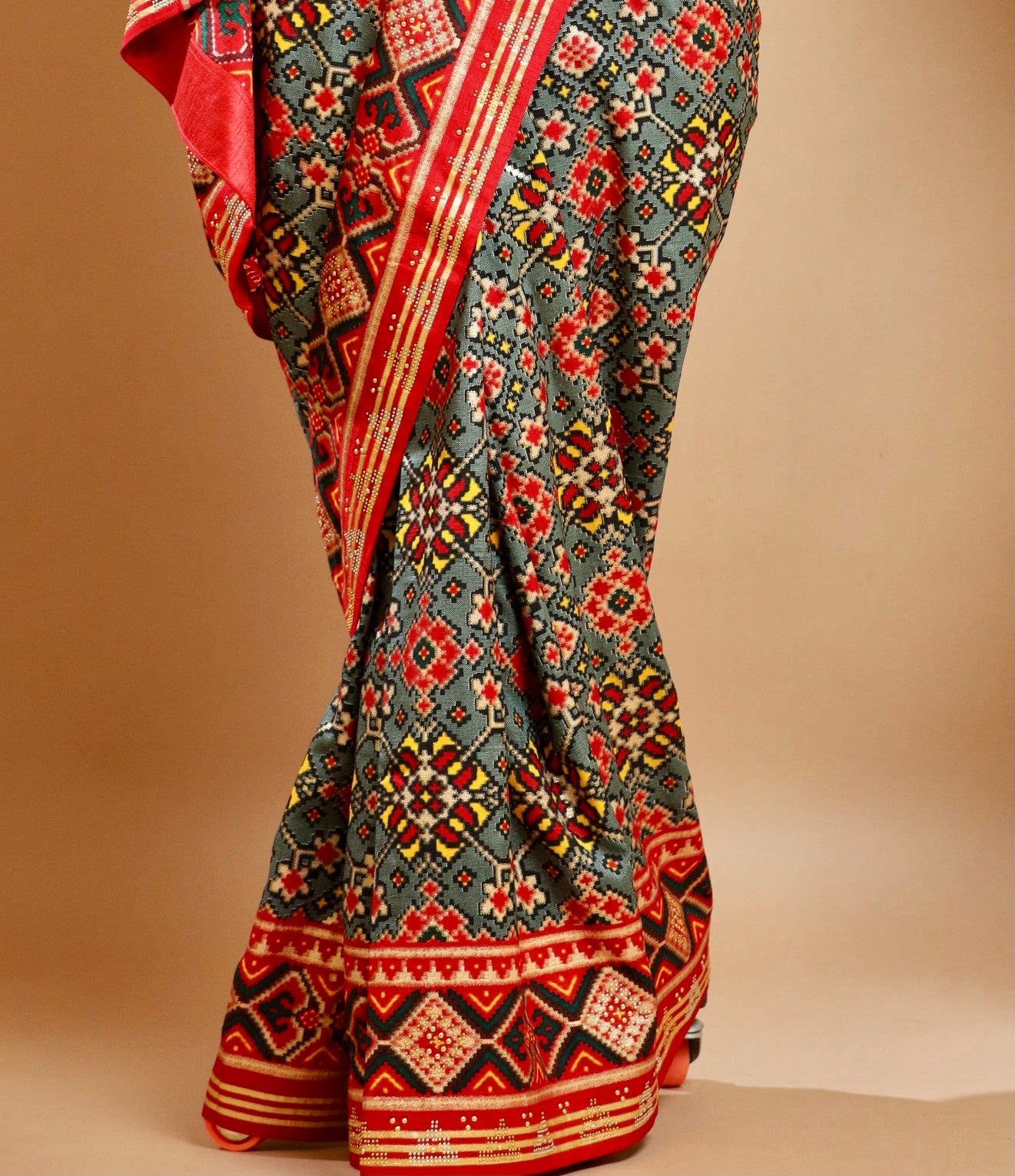 Enigmatic Grey & Red Patola Silk Saree