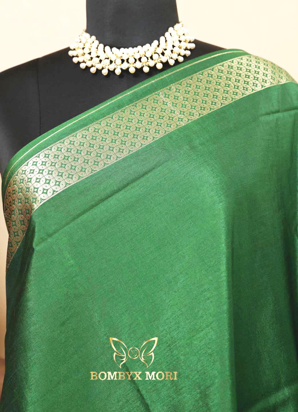 Modest Green and Golden Breeze Dola Silk Saree